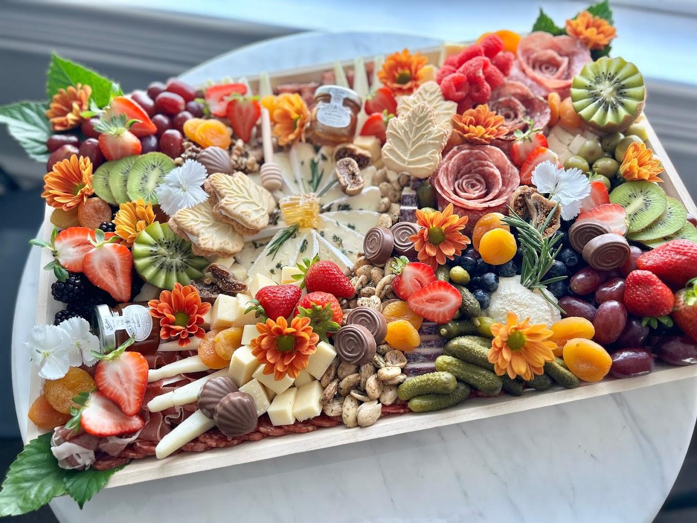 beautiful fall-inspired charcuterie board by Table and Board